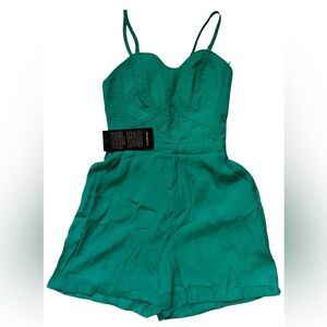 NWT-Bebe-stretchy, adjustable straps, bustier romper. Built in short